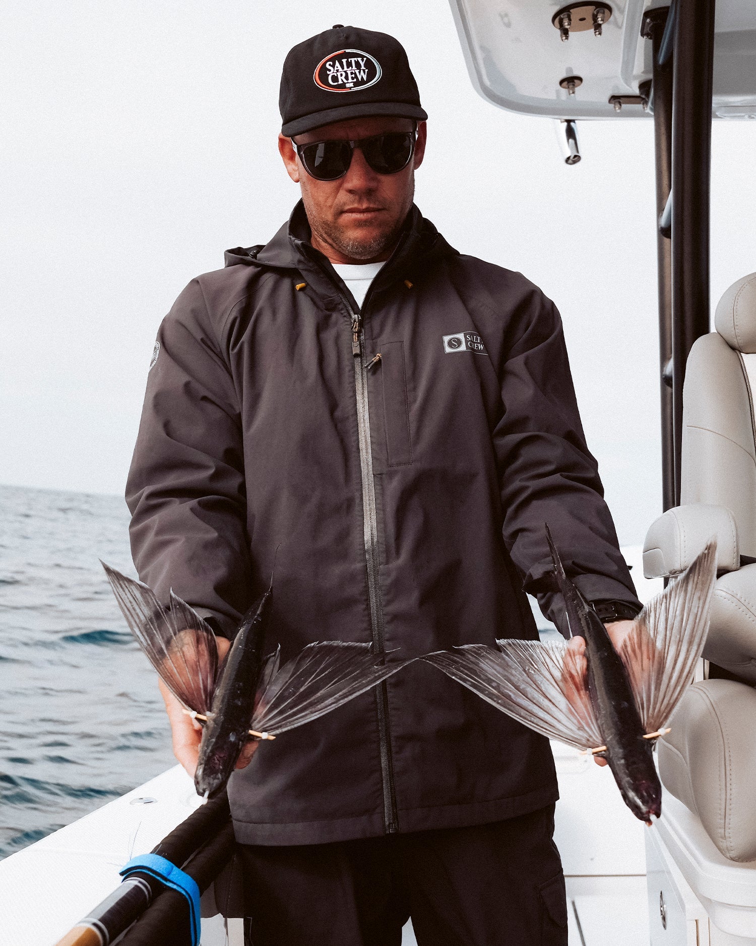 salty crew long range weatherproof water repellent jacket on the water black